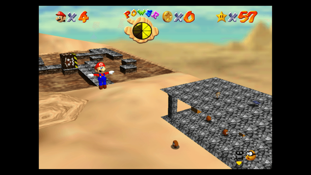 Super Mario 3D All-Stars Os visuais de Super Mario 64 combinam melhor com o modo portátil e as texturas mais simples (como a areia) são as que envelheceram melhor. (Imagem: Reprodução)